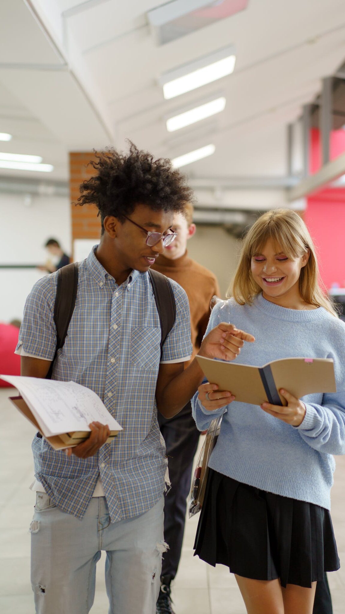 Young Man and Woman Having A Conversation At School